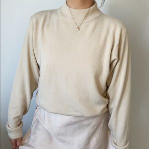 Vintage Beta’s choice nude mock neck